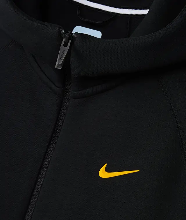sudadera nocta naranja. negra